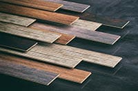 Laminate floor on black background. 3d illustration direct stick flooring